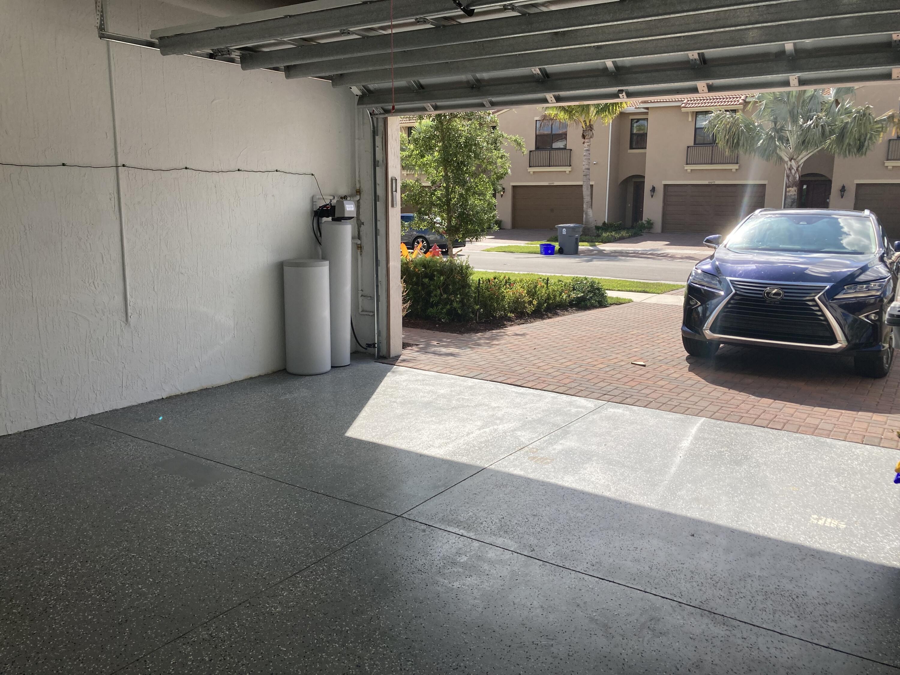 10092 Brickhill Drive Boca Raton, FL 33428 - Photo 30 of 42 a view of a car in garage
