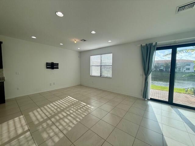 10092 Brickhill Drive Boca Raton, FL 33428 - Photo 9 of 42 a view of an empty room and window