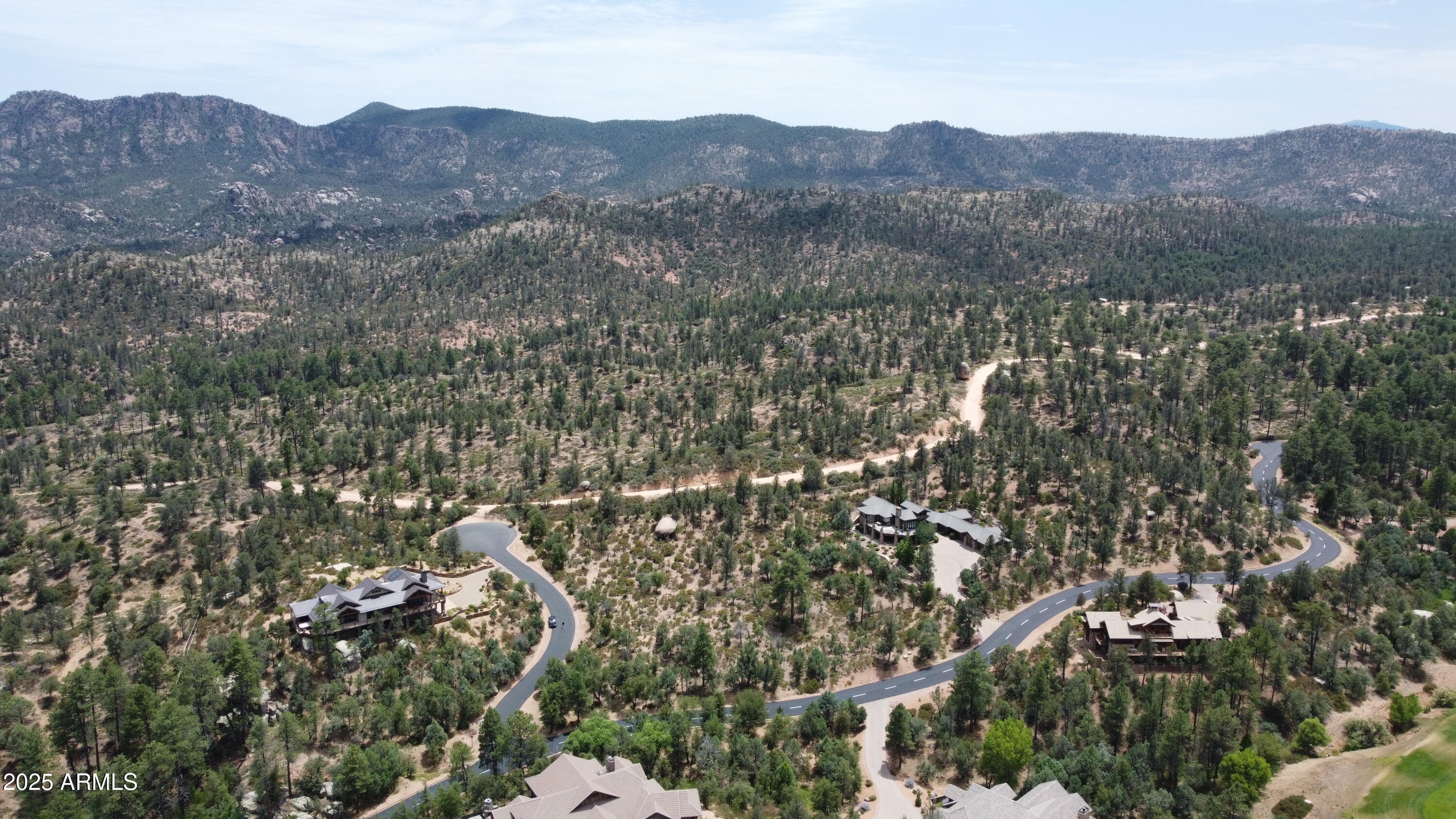 1000 South Dells Point, Unit 158 Payson, AZ 85541 - Photo 8 of 13 an aerial view of houses covered in trees