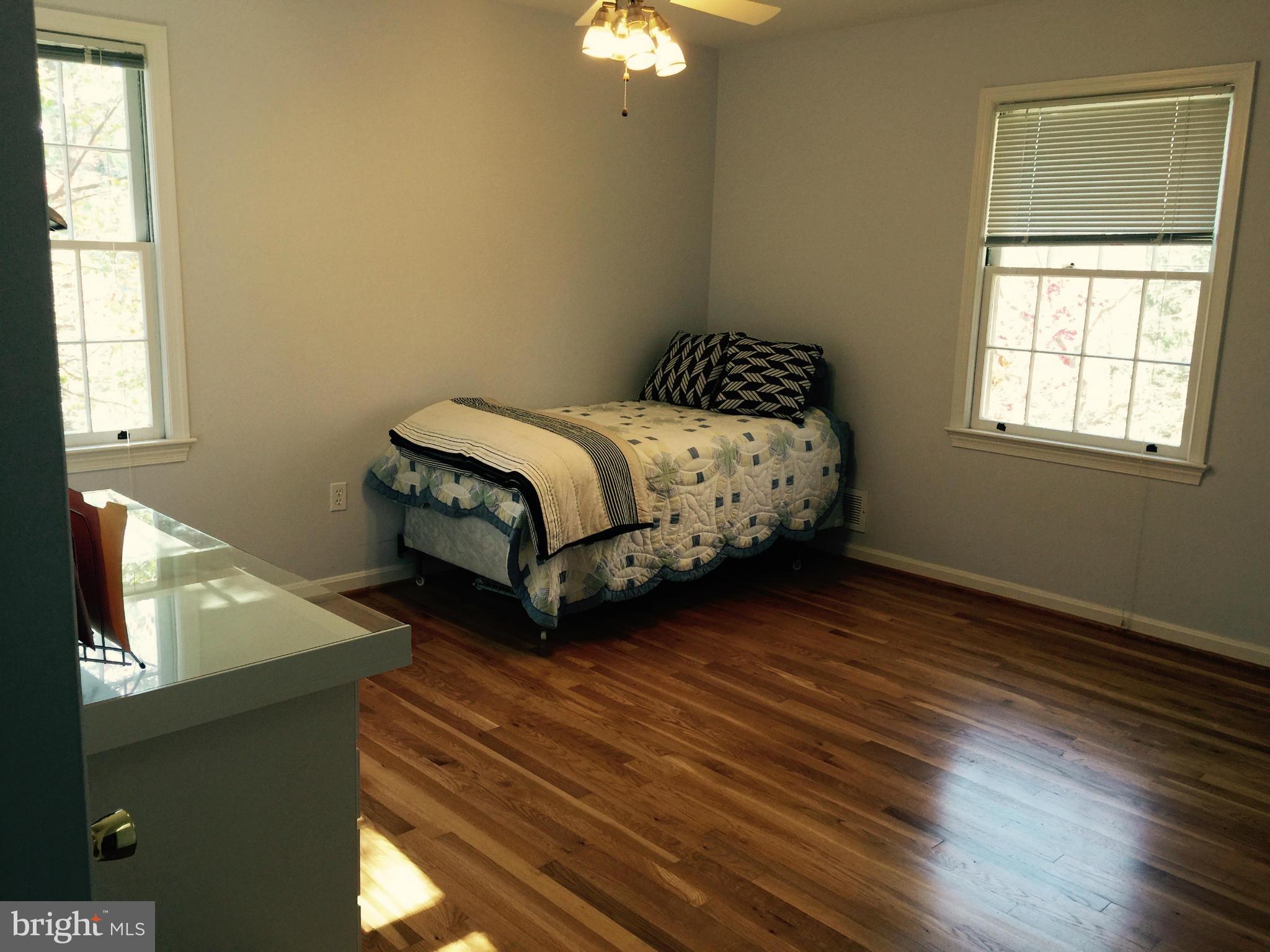 13601 Wendover Road Silver Spring, MD 20904 - Photo 18 of 30 Enormous Bedroom with gorgeous hardwood floors