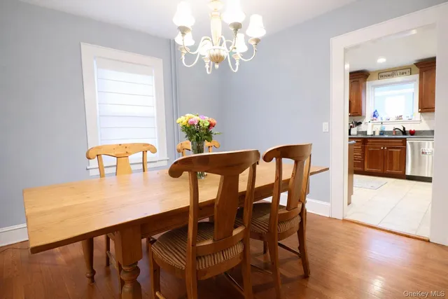 a view of kitchen with furniture and wooden floor