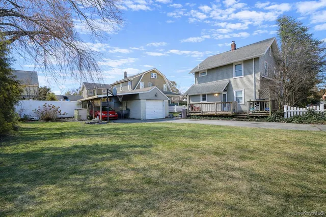 a view of a house with a big yard