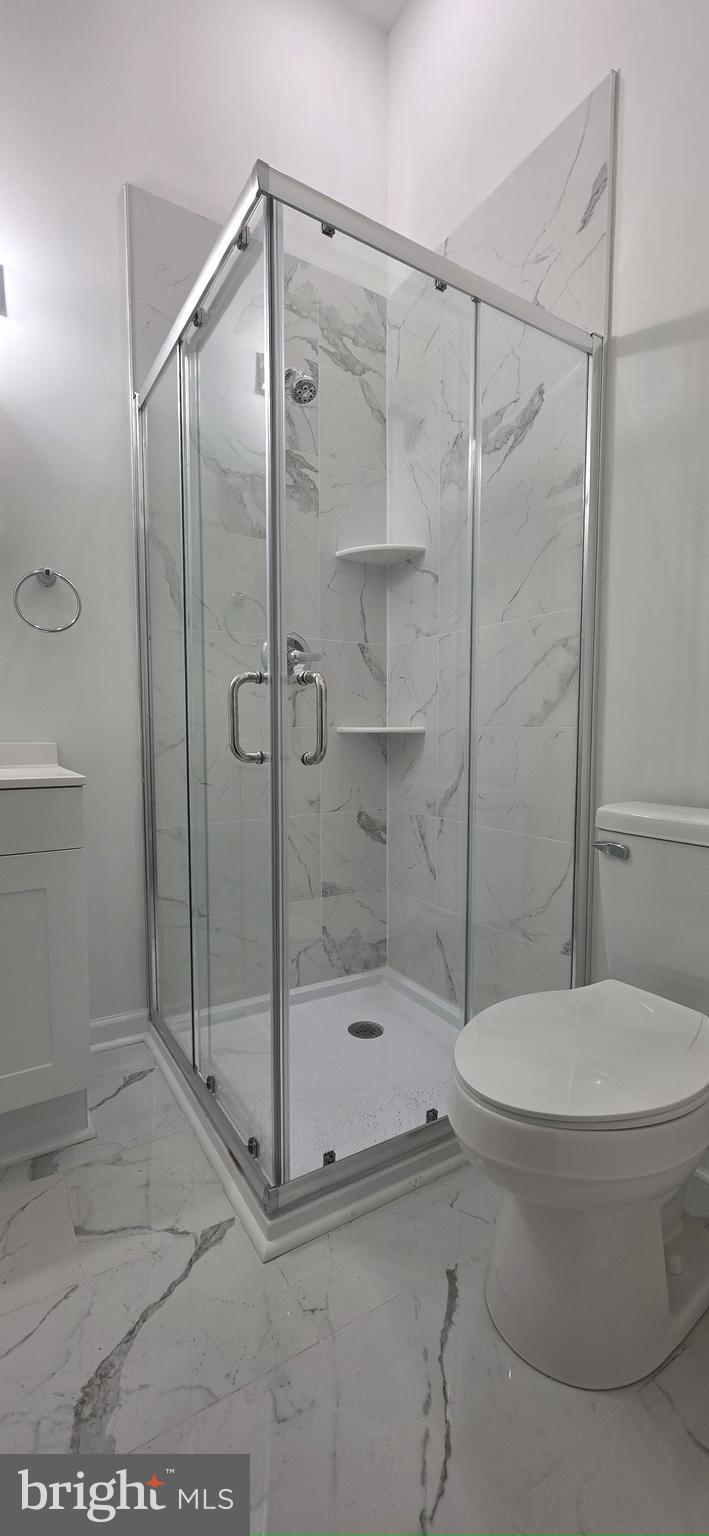 2233 North 16th Street Philadelphia, PA 19132 - Photo 5 of 21 a bathroom with a shower and a toilet
