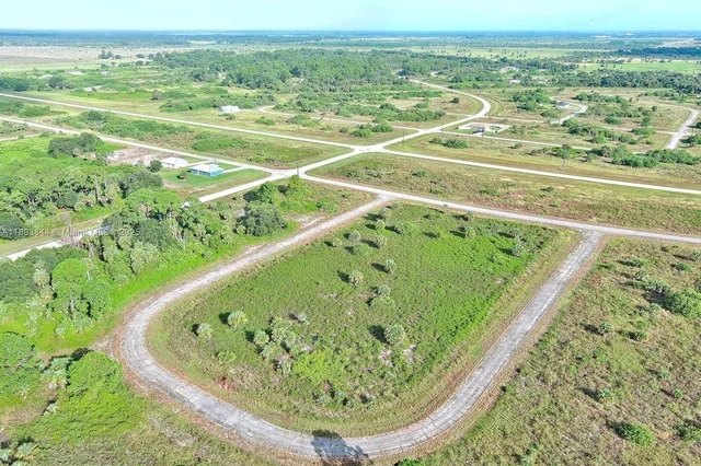 a view of a swimming pool with a balcony