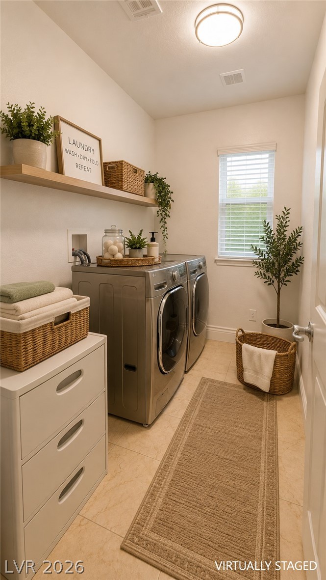 87 Tall Ruff Drive Las Vegas, NV 89148 - Photo 56 of 71 Functional and stylish, this laundry room features practical shelving for organization.