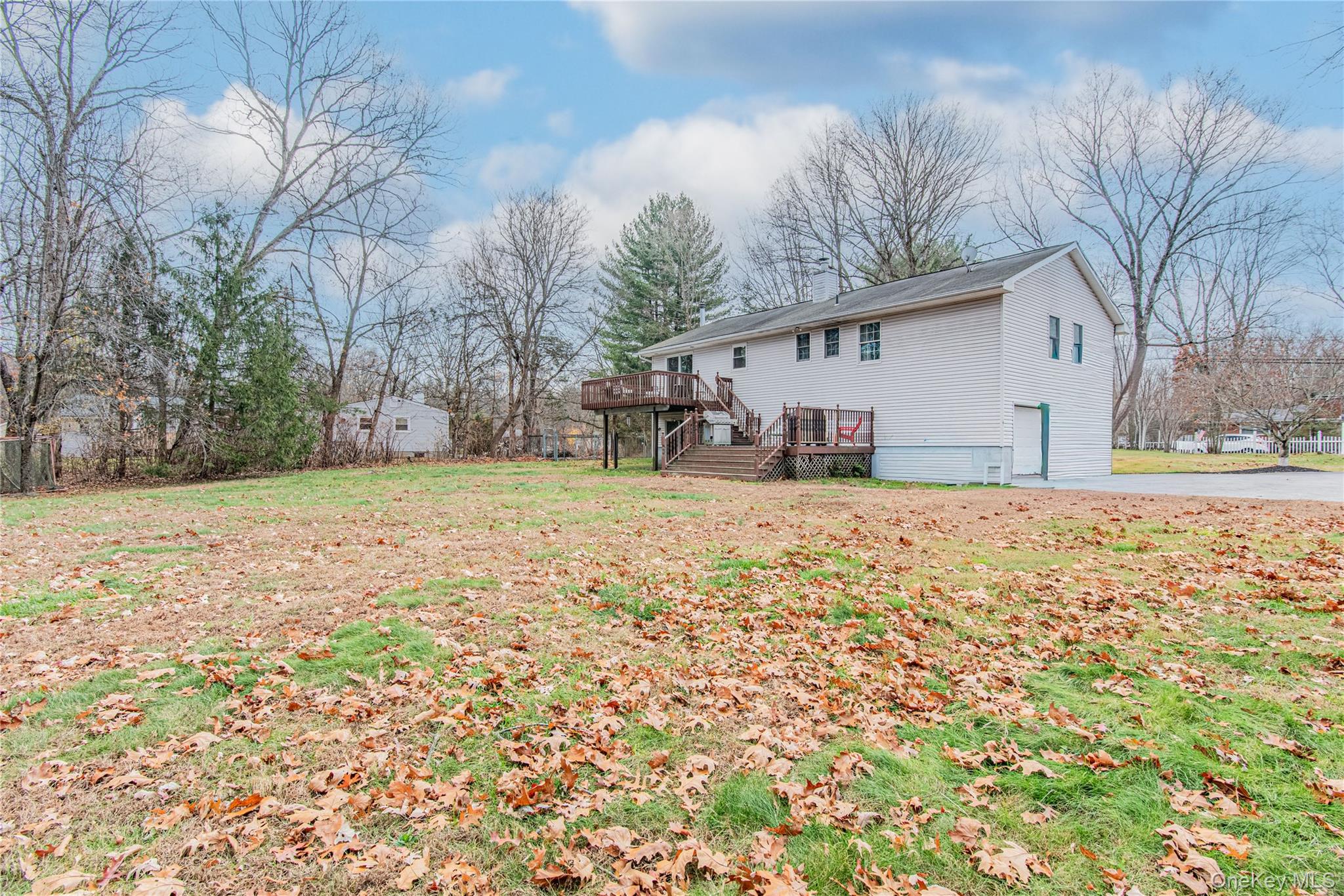105 Oak Ridge Road Hopewell Junction, NY 12533 - Photo 27 of 32 a house that has a tree in front of it