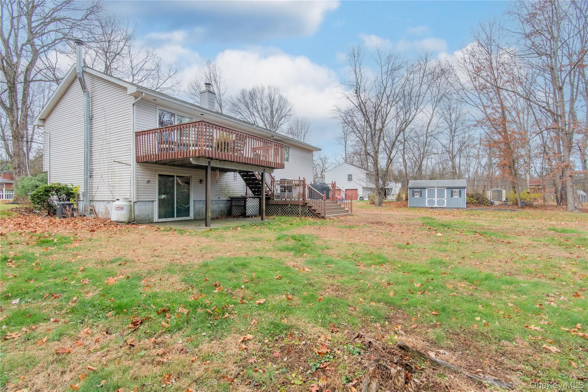 105 Oak Ridge Road Hopewell Junction, NY 12533 - Photo 28 of 32 a front view of a house with a yard