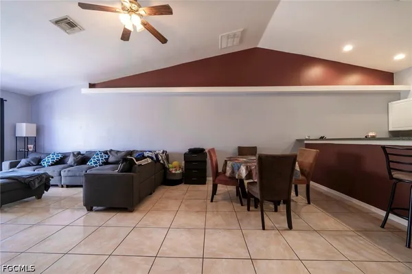 a view of a dining room with furniture