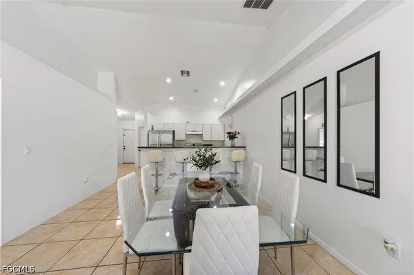 a view of a dining room with furniture