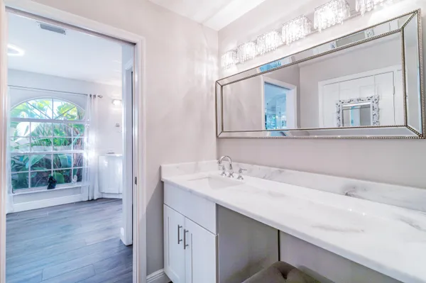 a view of a livingroom with furniture and wooden floor