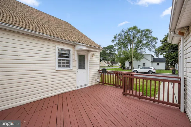 a view of a backyard with a deck