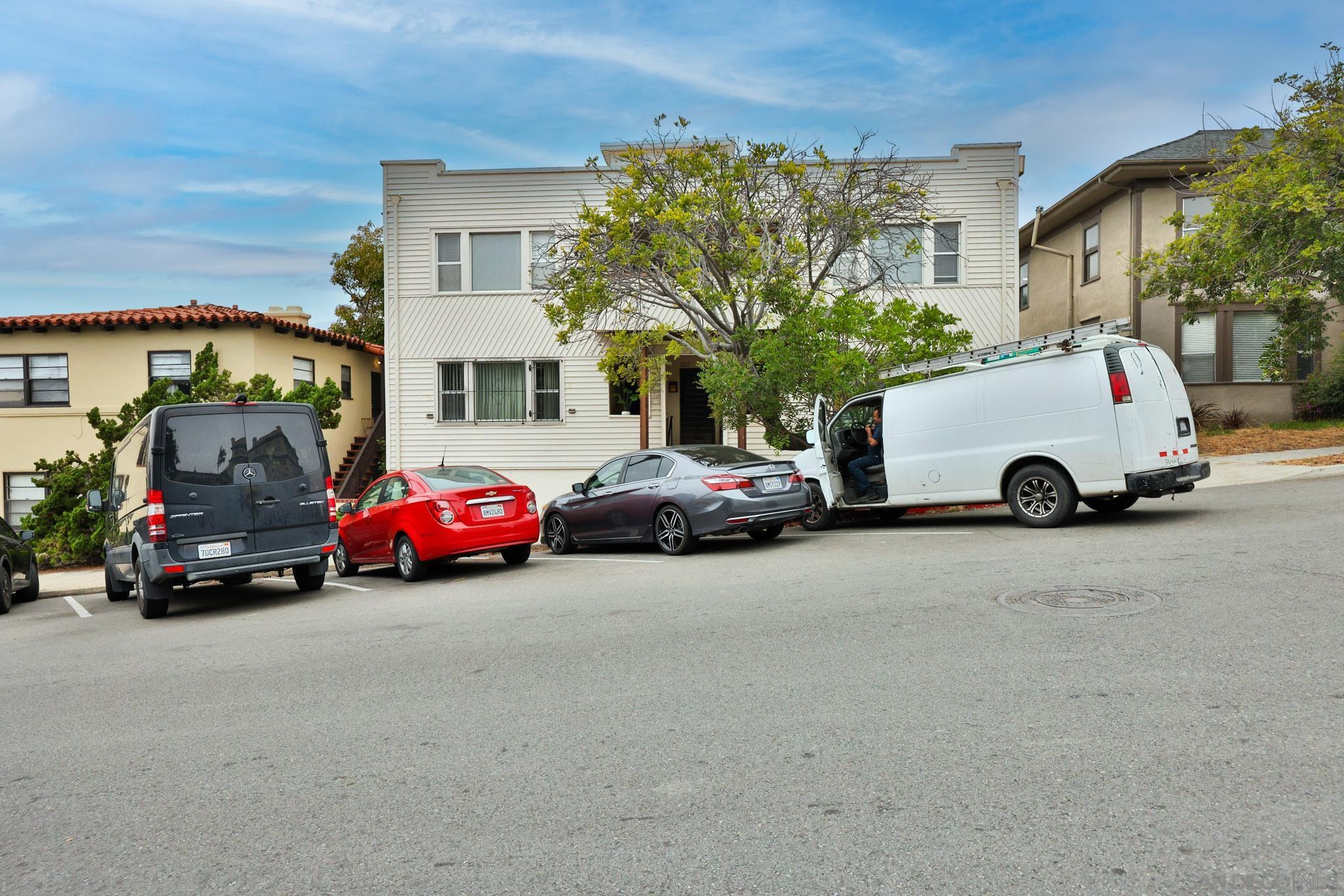 2220 E Street San Diego, CA 92102 - Photo 3 of 13 a view of car parked in front of a building