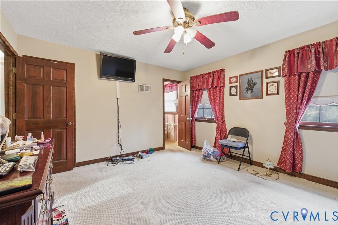 12508 Percival Street Chester, VA 23831 - Photo 18 of 30 a view of a workspace with furniture and a window