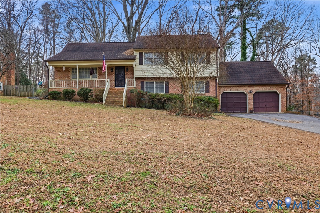 12508 Percival Street Chester, VA 23831 - Photo 2 of 30 a view of a house with a yard and large tree