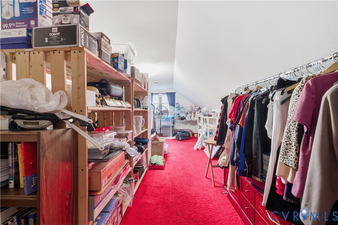 12508 Percival Street Chester, VA 23831 - Photo 21 of 30 a view of walk in closet with clothes and shoes