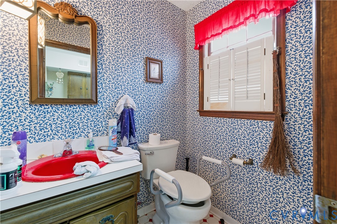 12508 Percival Street Chester, VA 23831 - Photo 26 of 30 a bathroom with a sink mirror and toilet