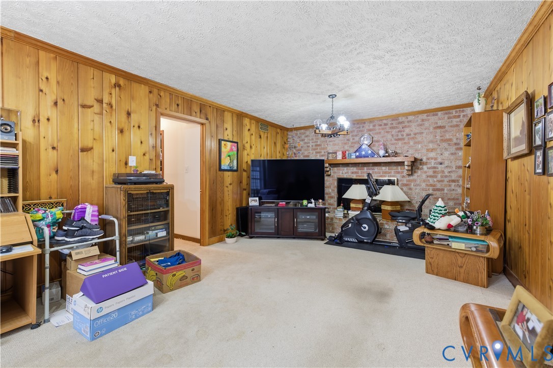 12508 Percival Street Chester, VA 23831 - Photo 29 of 30 a living room with furniture and a flat screen tv