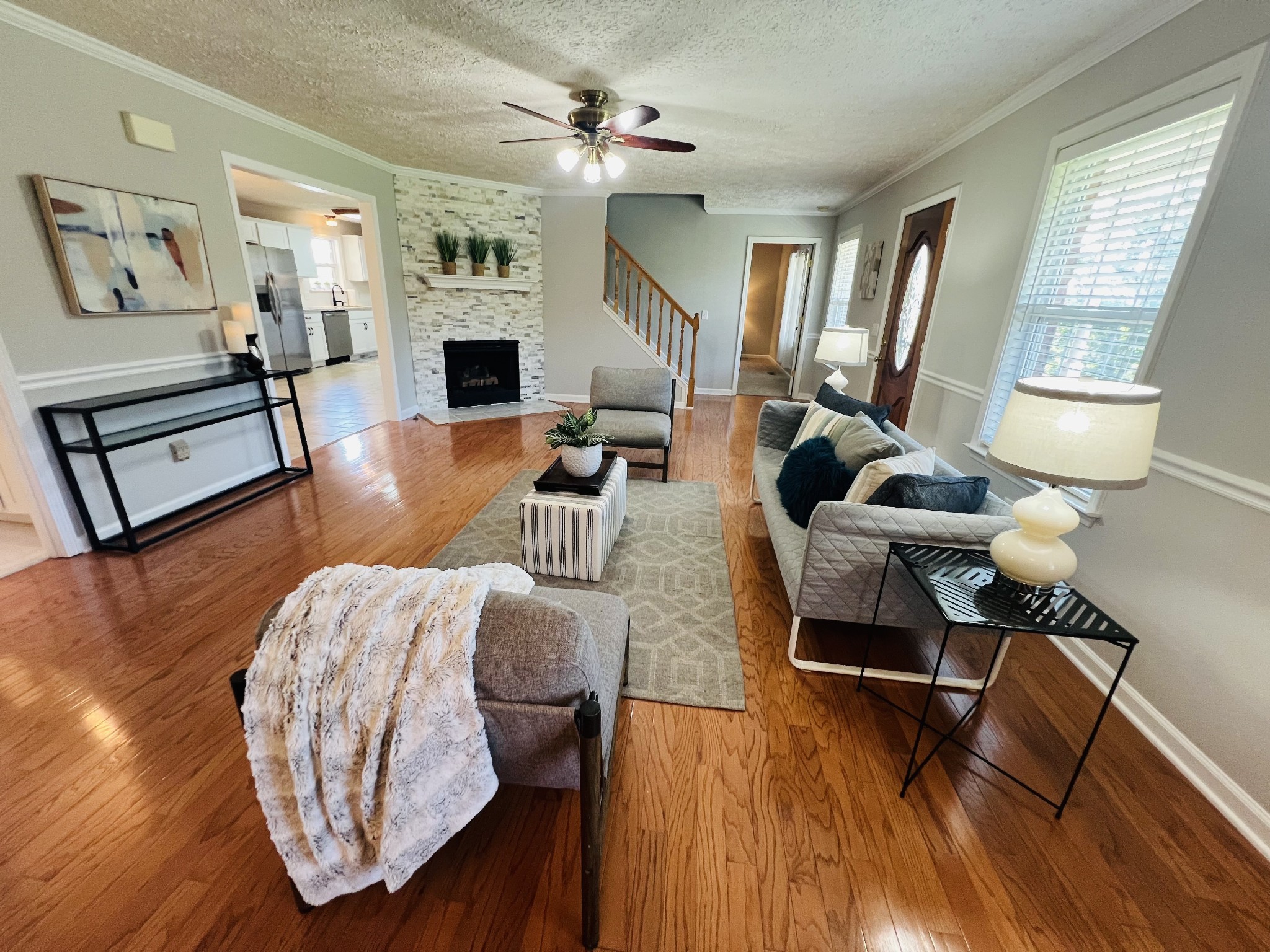 5345 Ashburn Road Springfield, TN 37172 - Photo 19 of 46 a living room with furniture fireplace and wooden floor