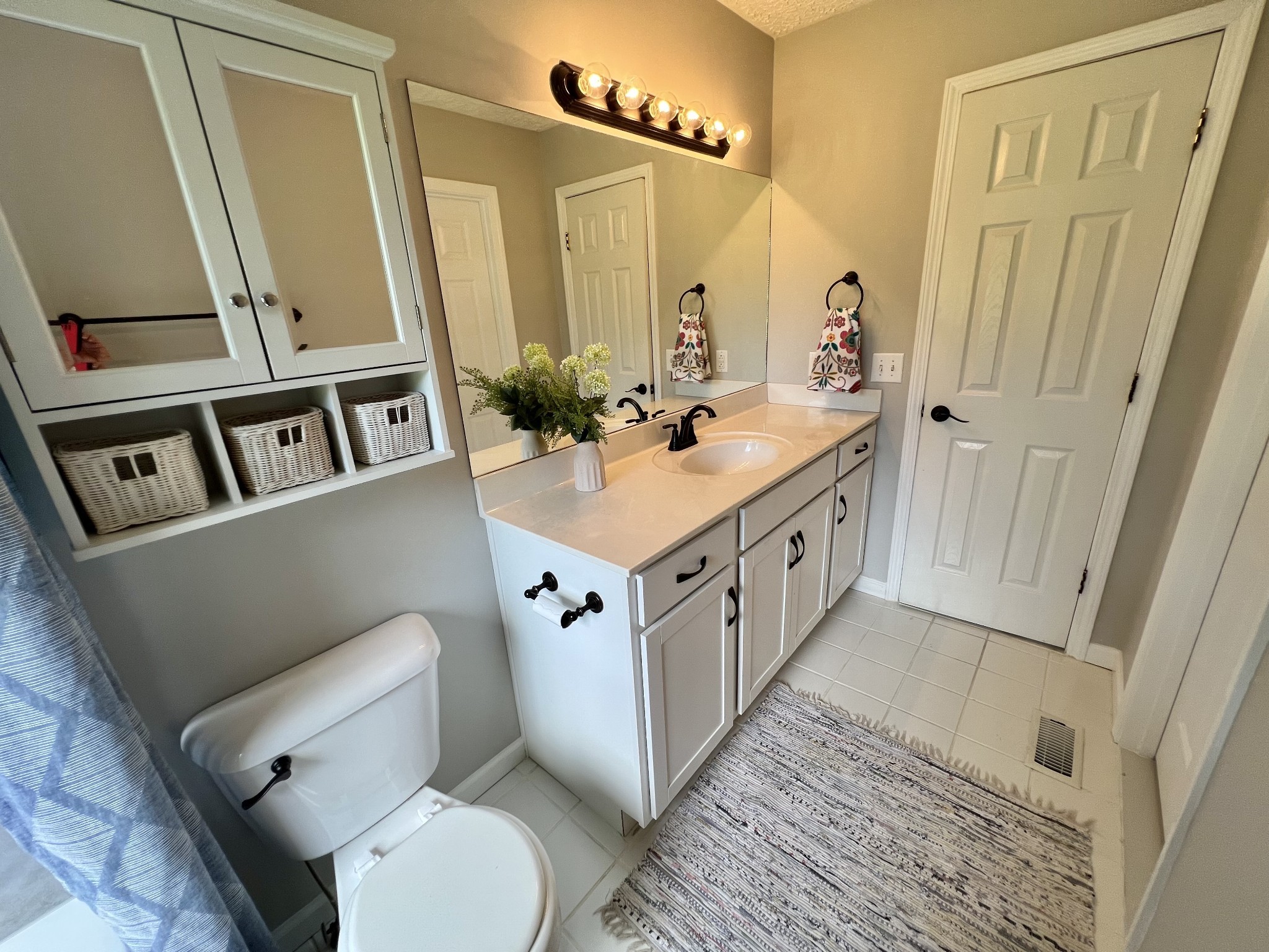 5345 Ashburn Road Springfield, TN 37172 - Photo 25 of 46 a bathroom with a sink a toilet and mirror
