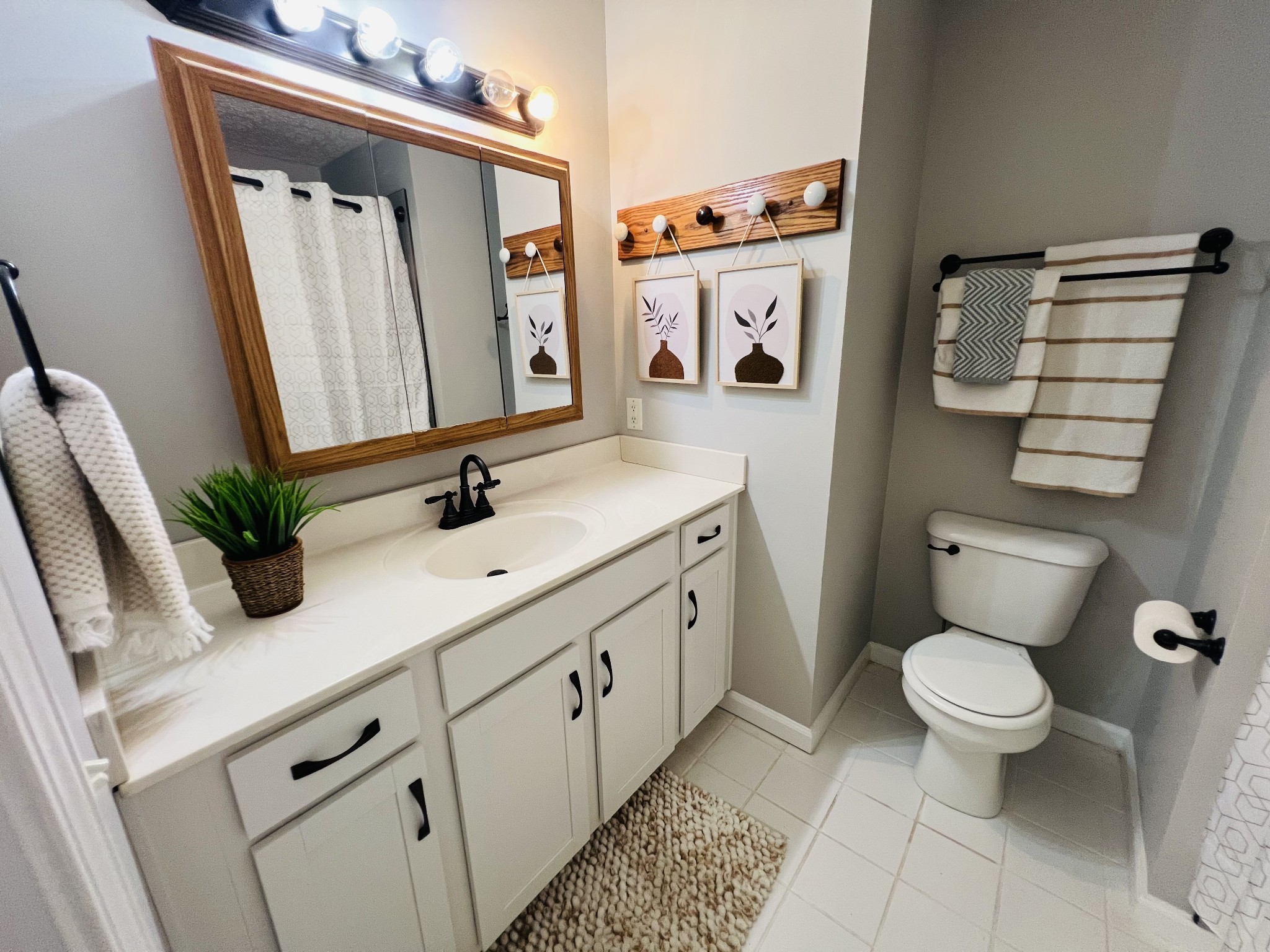 5345 Ashburn Road Springfield, TN 37172 - Photo 34 of 46 a bathroom with a granite countertop sink toilet and shower