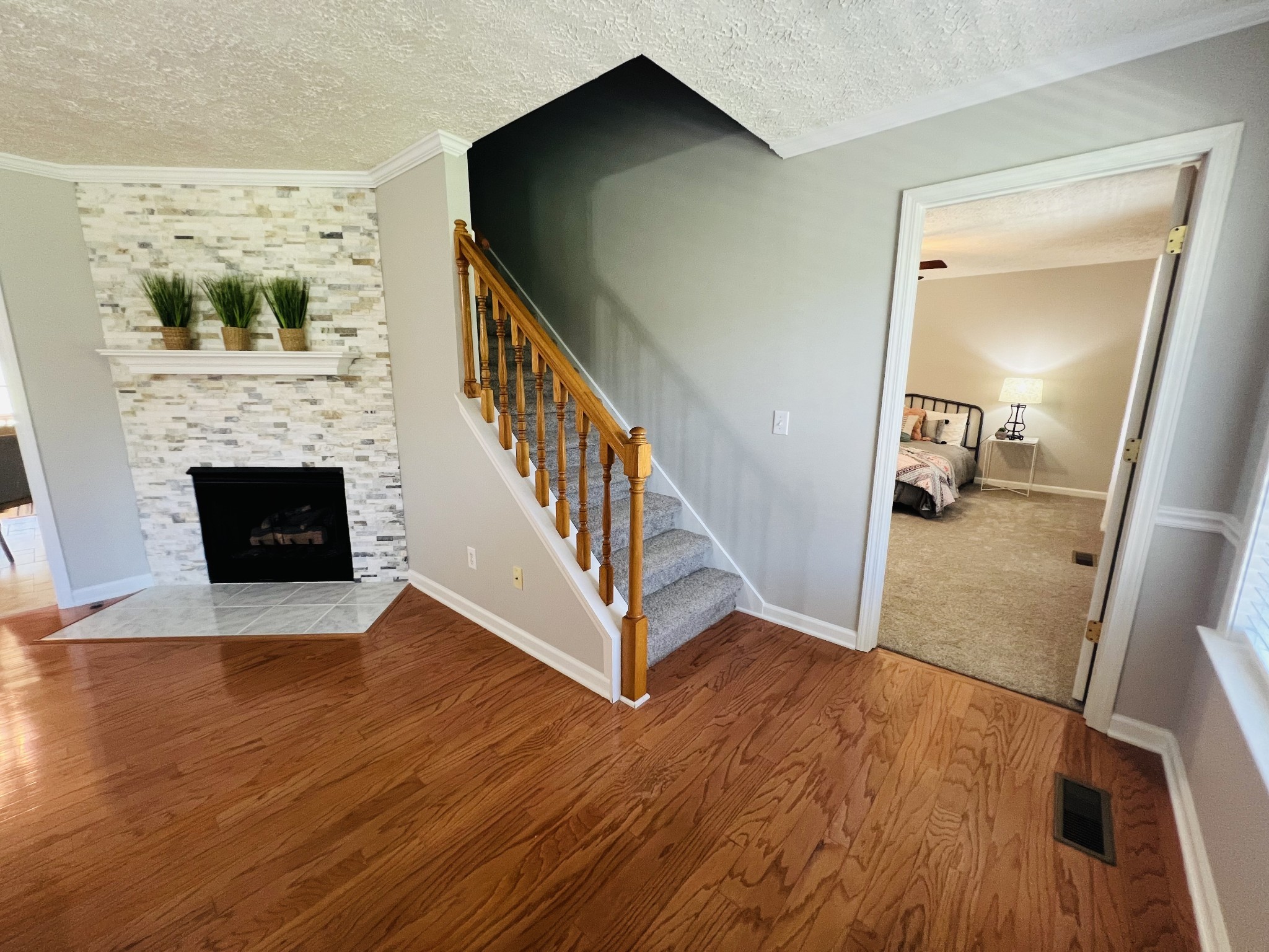5345 Ashburn Road Springfield, TN 37172 - Photo 36 of 46 a view of a hallway with wooden floor and staircase