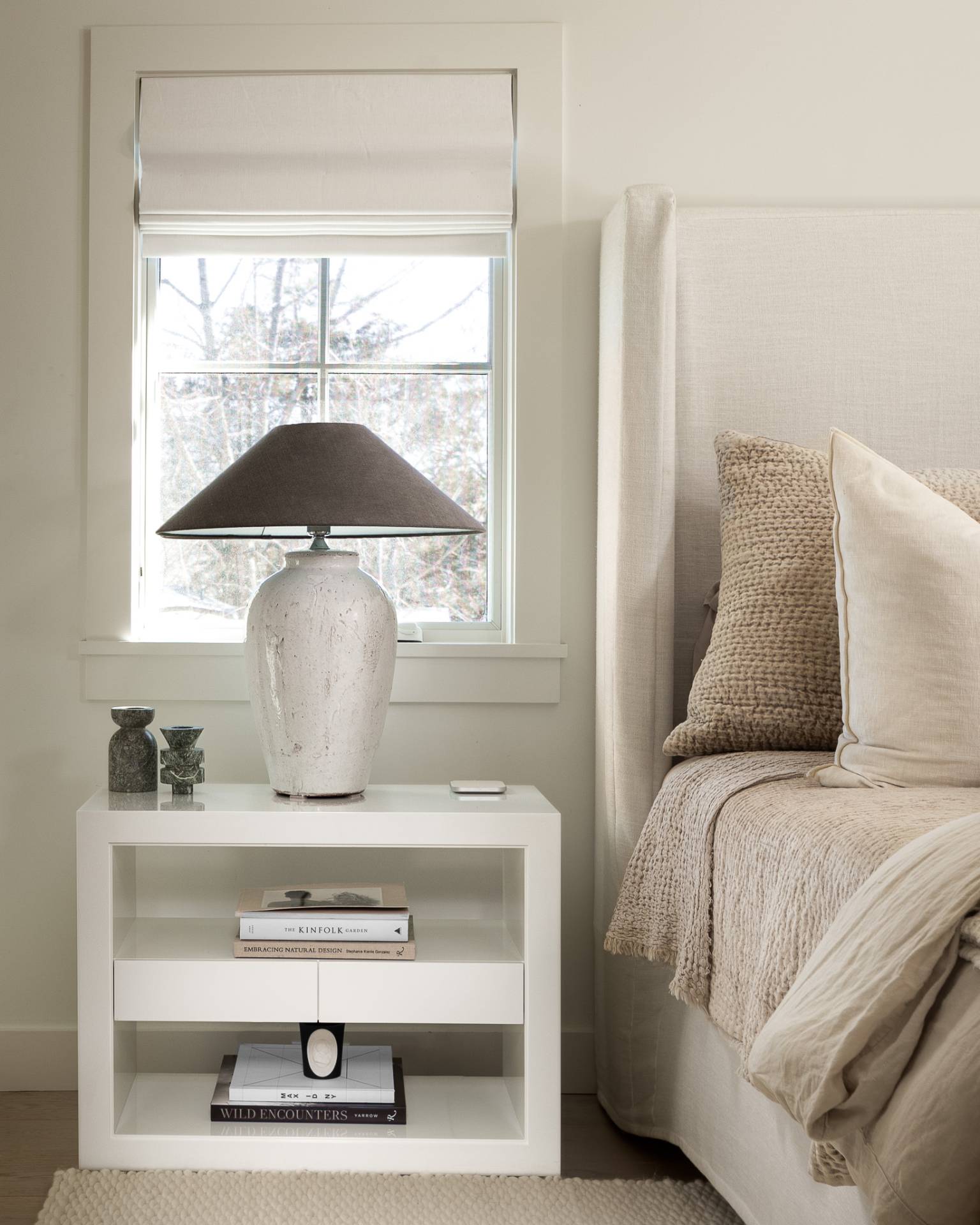 110 Ferry Road Sag Harbor, NY 11963 - Photo 15 of 17 a room with a bed and a window