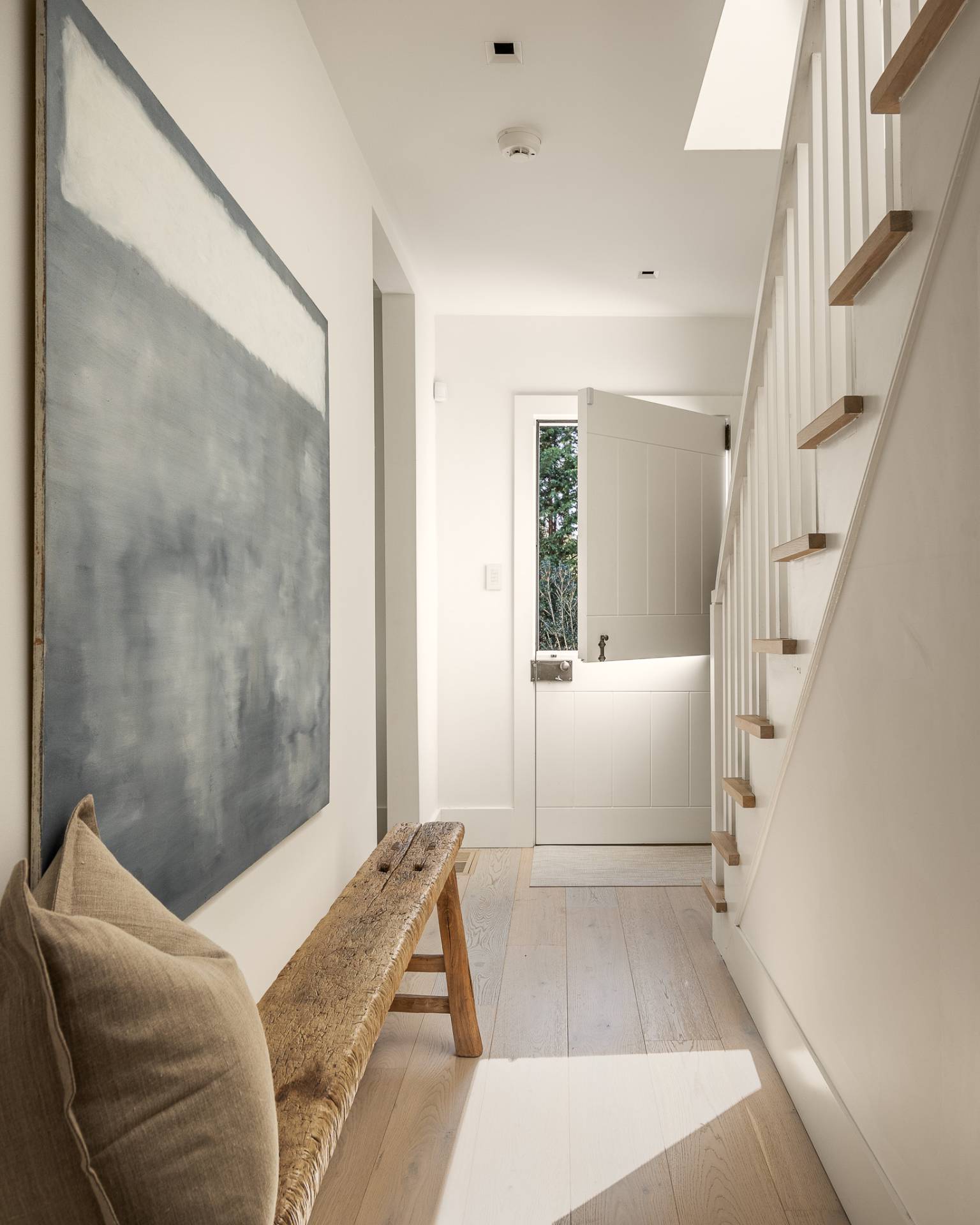 110 Ferry Road Sag Harbor, NY 11963 - Photo 17 of 17 a living room with furniture and a rug