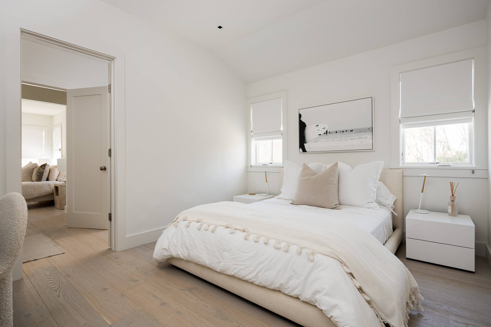 110 Ferry Road Sag Harbor, NY 11963 - Photo 3 of 17 a bedroom with a bed and a couch