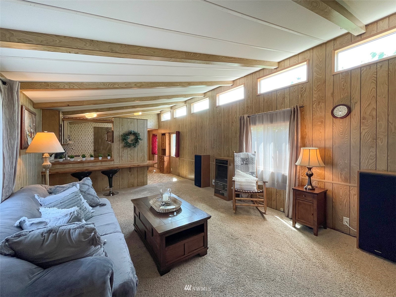 141 Streit Road Sequim, WA 98382 - Photo 11 of 40 a living room with furniture and a chandelier