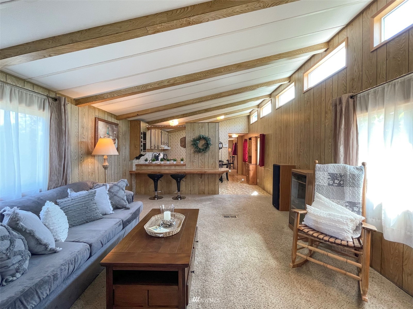141 Streit Road Sequim, WA 98382 - Photo 12 of 40 a living room with furniture and a table