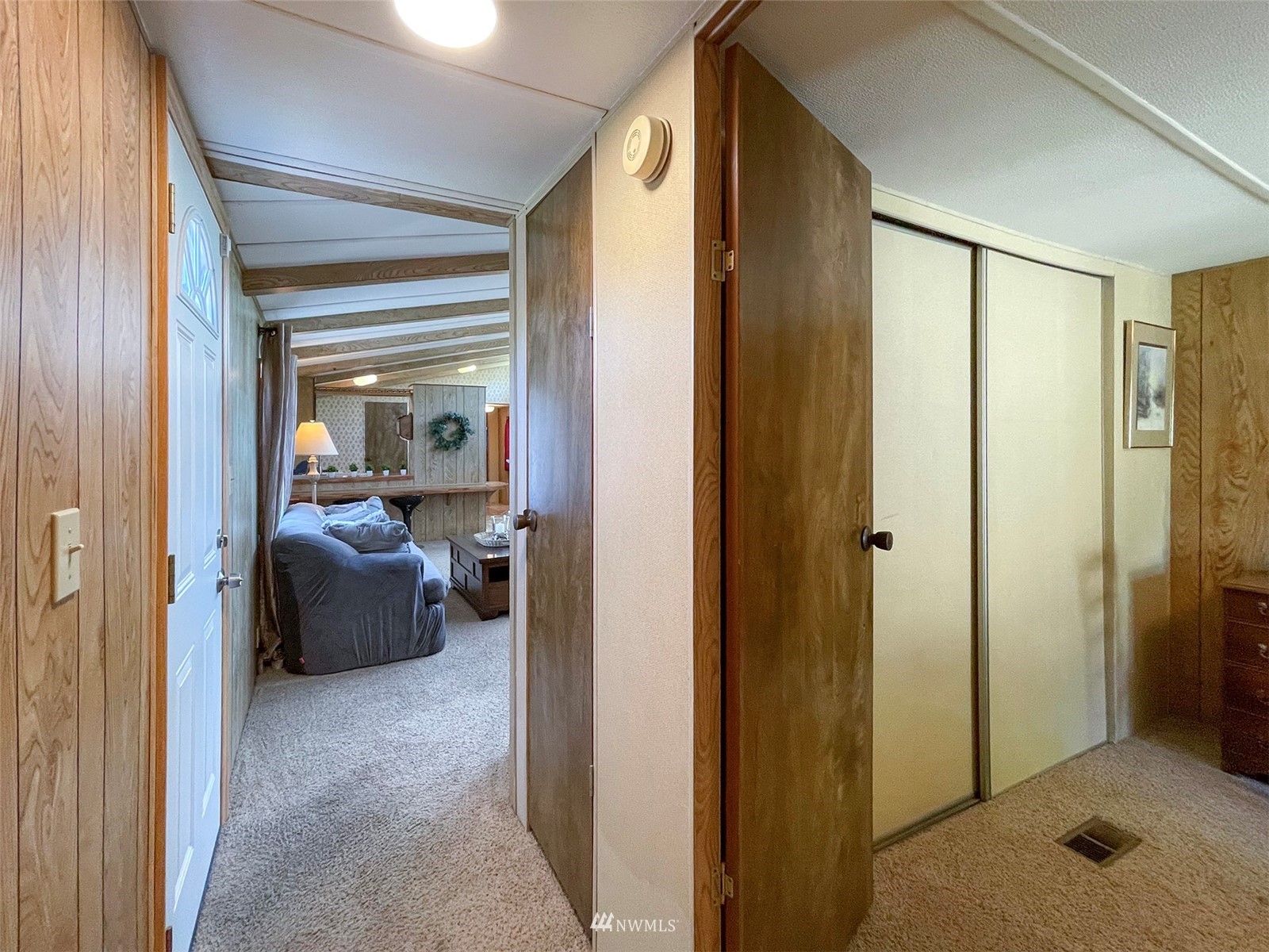 141 Streit Road Sequim, WA 98382 - Photo 27 of 40 a view of a hallway with furniture and bedroom view