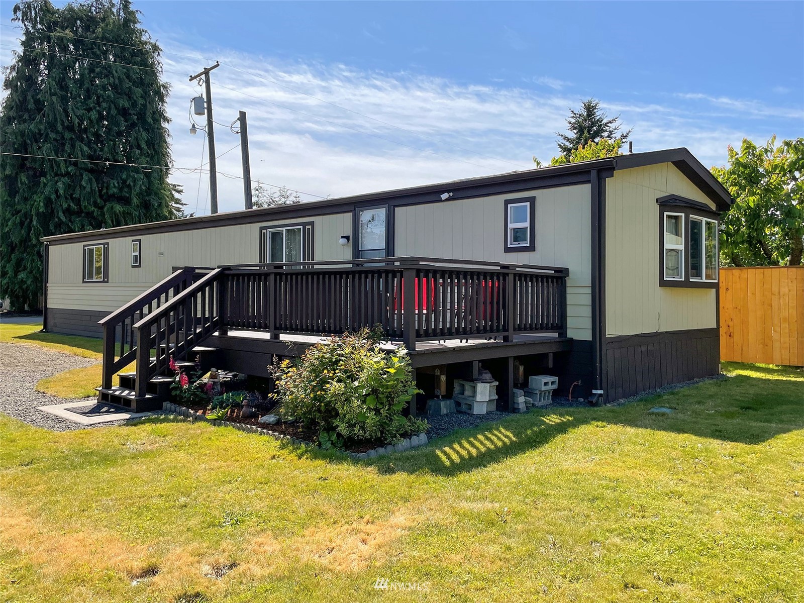 141 Streit Road Sequim, WA 98382 - Photo 34 of 40 a view of a house with a swimming pool