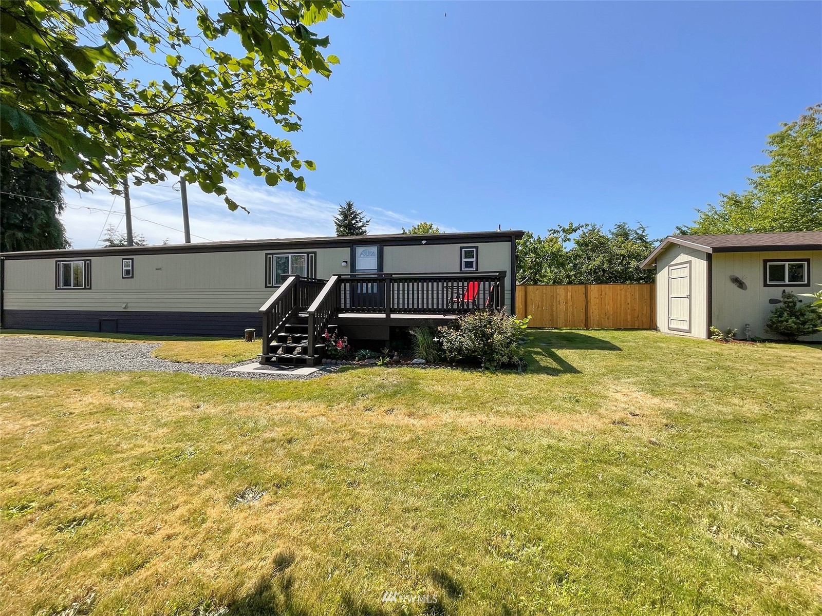 141 Streit Road Sequim, WA 98382 - Photo 35 of 40 a view of a house with a backyard