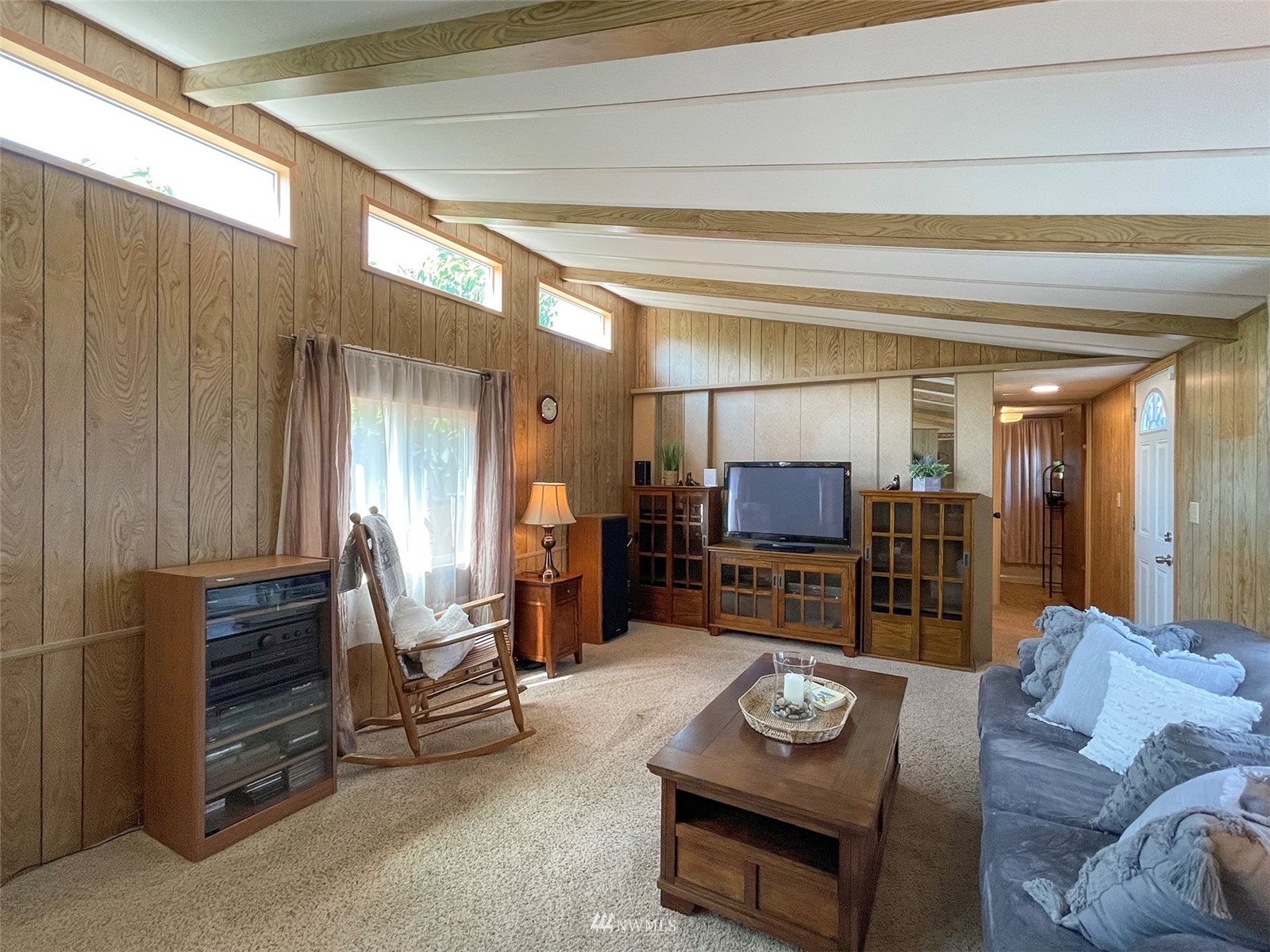 141 Streit Road Sequim, WA 98382 - Photo 10 of 40 a living room with furniture and a wooden floor