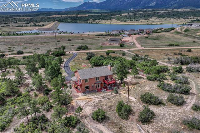 2690 Spaatz Road Monument, CO 80132 - Photo 44 of 50 Birds eye view of property featuring a water and mountain view