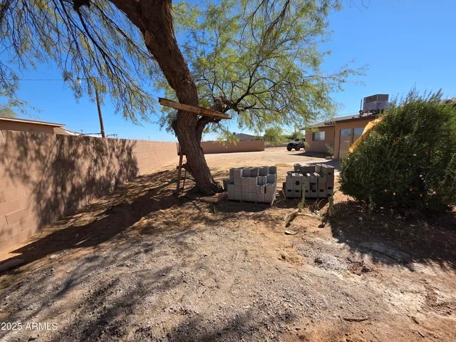 a view of a house with a snow on the road