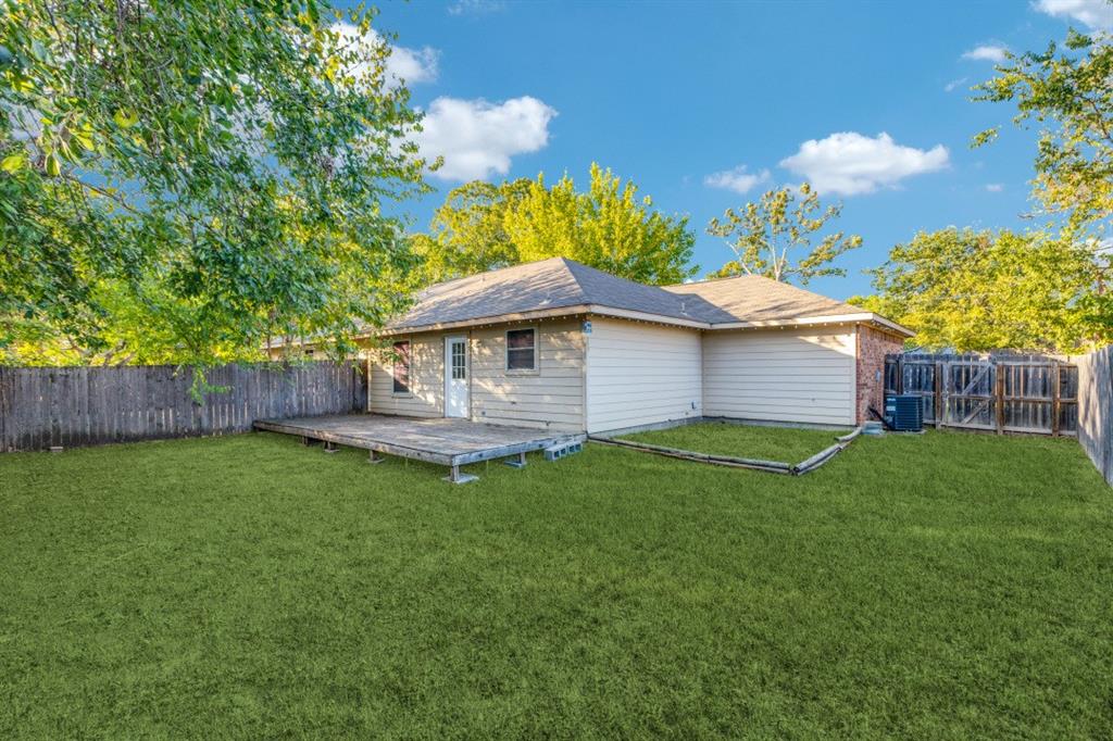 204 Gerrish Street McKinney, TX 75069 - Photo 11 of 12 a backyard of a house with lots of green space