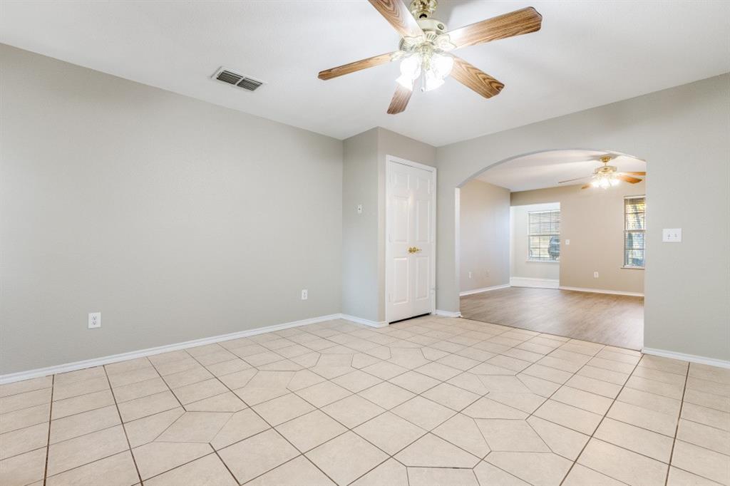 204 Gerrish Street McKinney, TX 75069 - Photo 2 of 12 a view of an empty room and chandelier fan