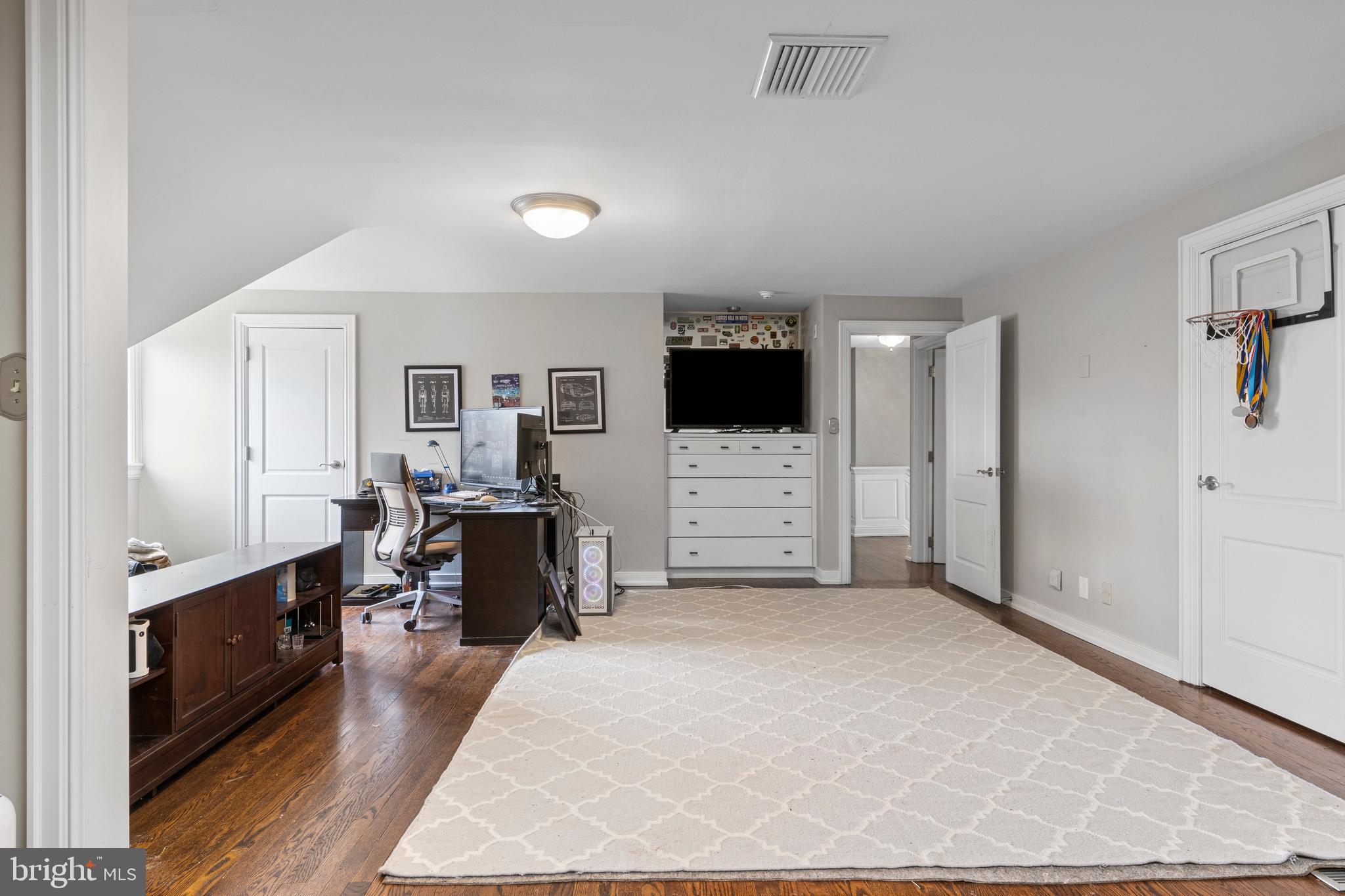 720 Brooke Road Wayne, PA 19087 - Photo 46 of 70 a living room with furniture and a flat screen tv