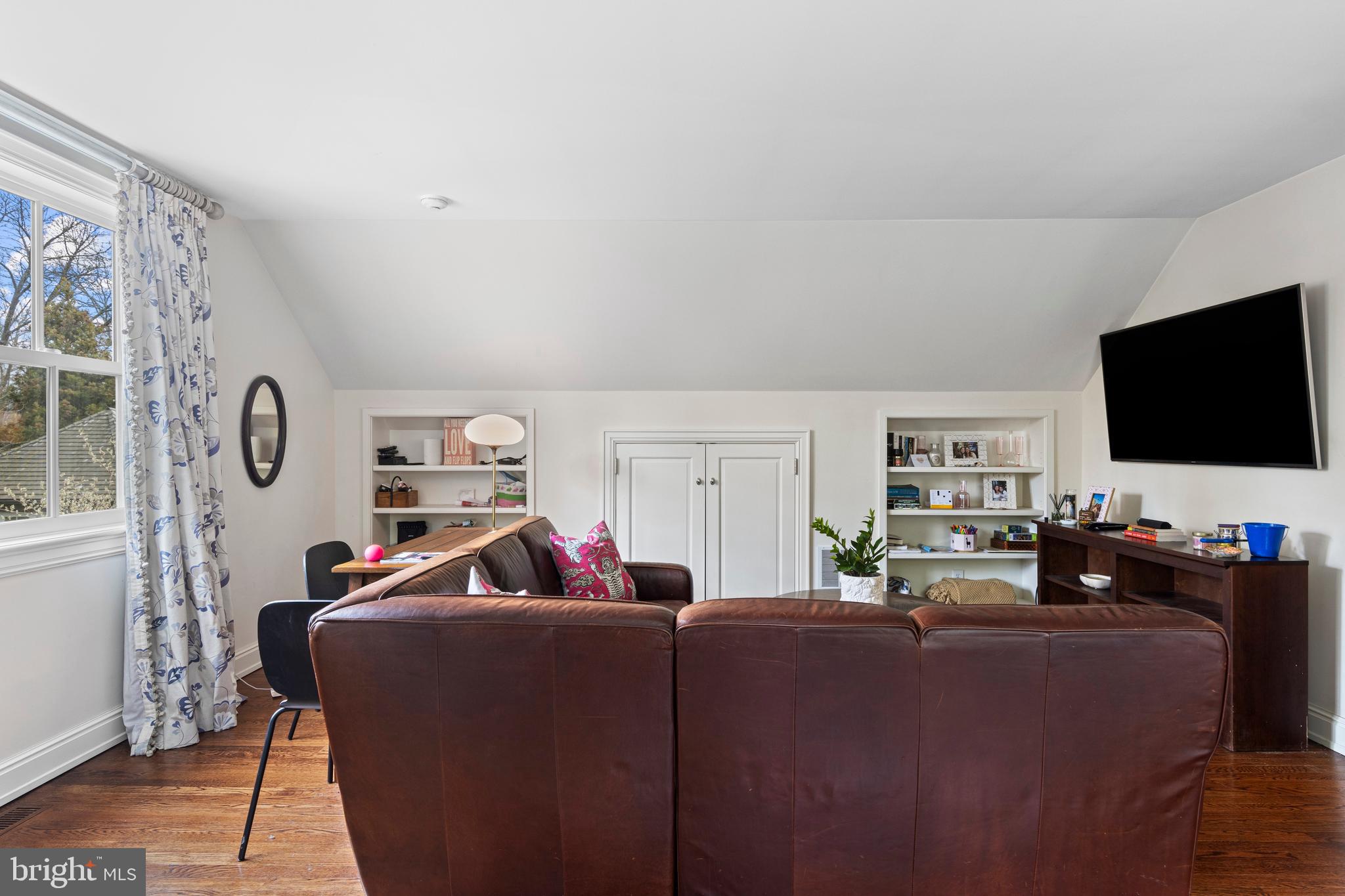 720 Brooke Road Wayne, PA 19087 - Photo 50 of 70 a living room with furniture and a flat screen tv