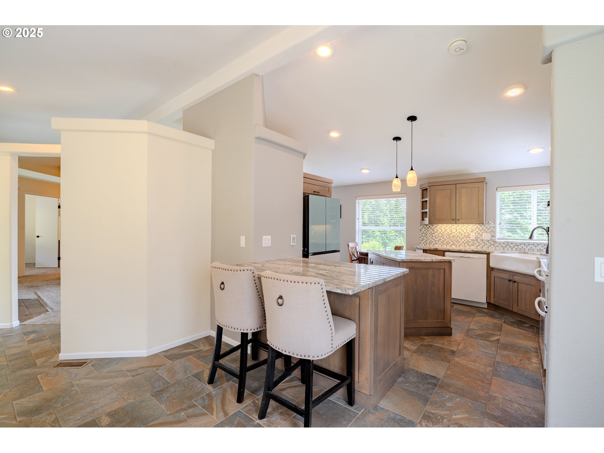 28703 Northeast Lookout Road Camas, WA 98607 - Photo 7 of 33 a kitchen with a sink cabinets and wooden floor