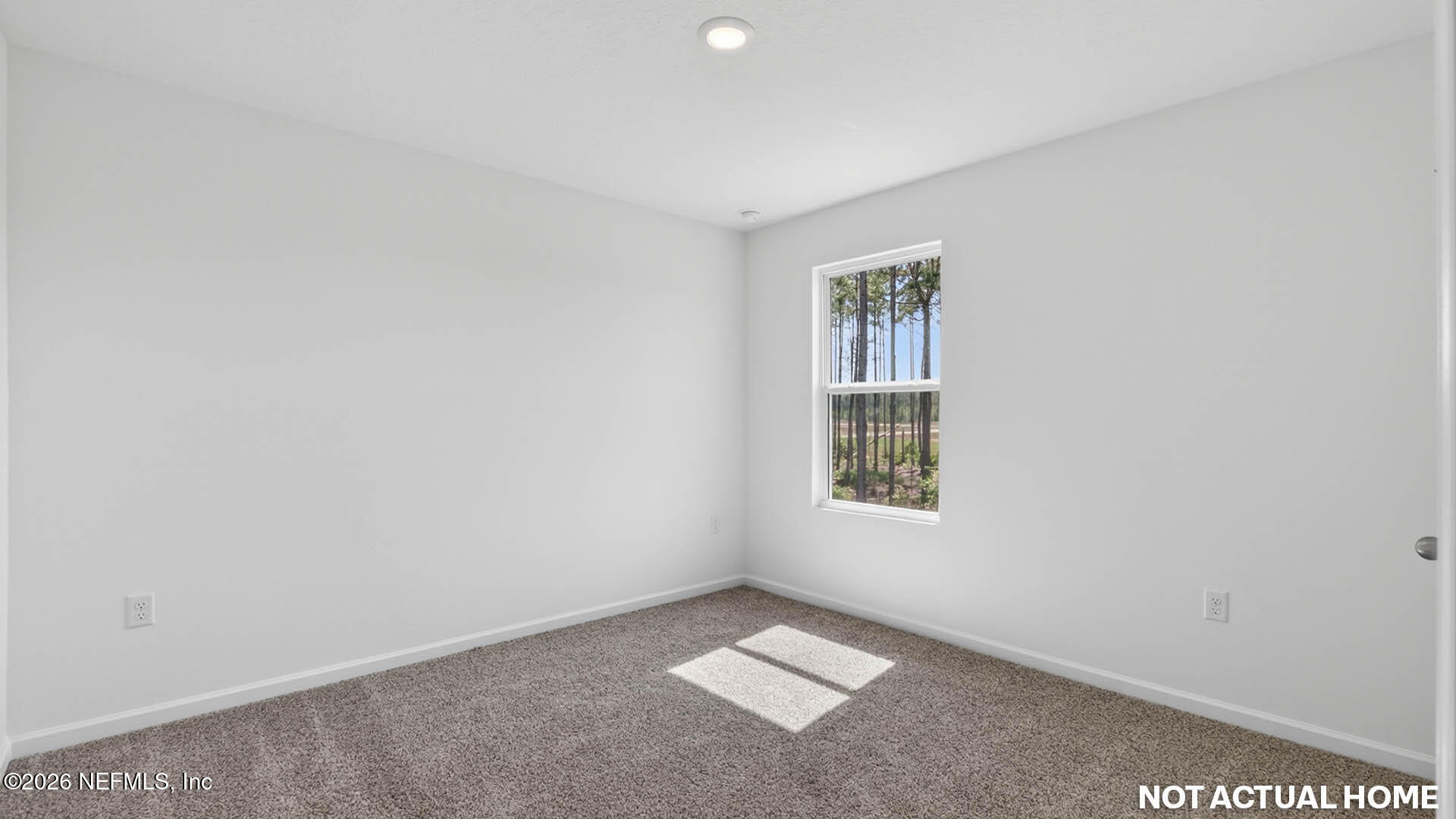 12095 Yew Tree Road Jacksonville, FL 32218 - Photo 27 of 61 an empty room with windows