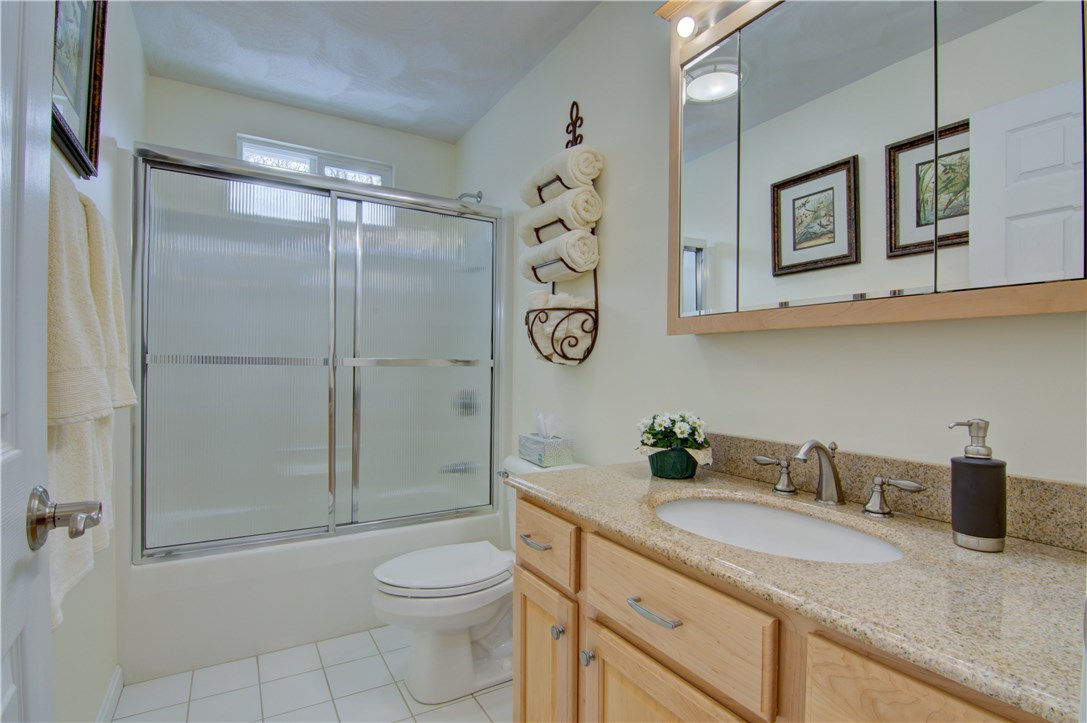 188 Ridge Drive Exeter, RI 02822 - Photo 24 of 40 Family Bath: Fiberglass Tub w/Shower. Granite counters. Medicine Cabinet. Tile Floor.
