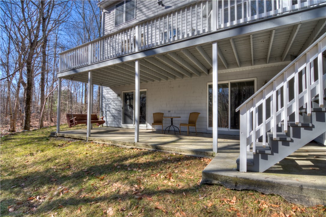 188 Ridge Drive Exeter, RI 02822 - Photo 32 of 40 Three Levels of Living - 3 sliders on Lower Level to Patio.