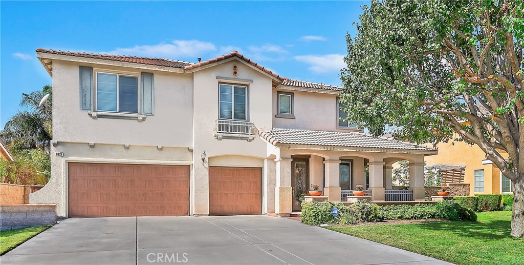 6827 Raspberry Court Eastvale, CA 92880 - Photo 1 of 1 a front view of a house with garden