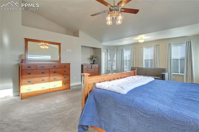 9947 Rockingham Drive Peyton, CO 80831 - Photo 16 of 43 Primary bedroom on main level