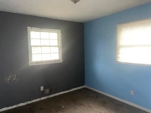 an empty room with a window