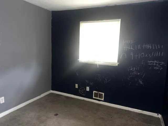 an empty room with a window