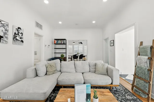 a living room with furniture and a couch