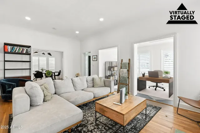 a view of a dining table and chairs in a room